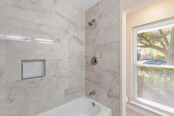 a bathroom with a bathtub