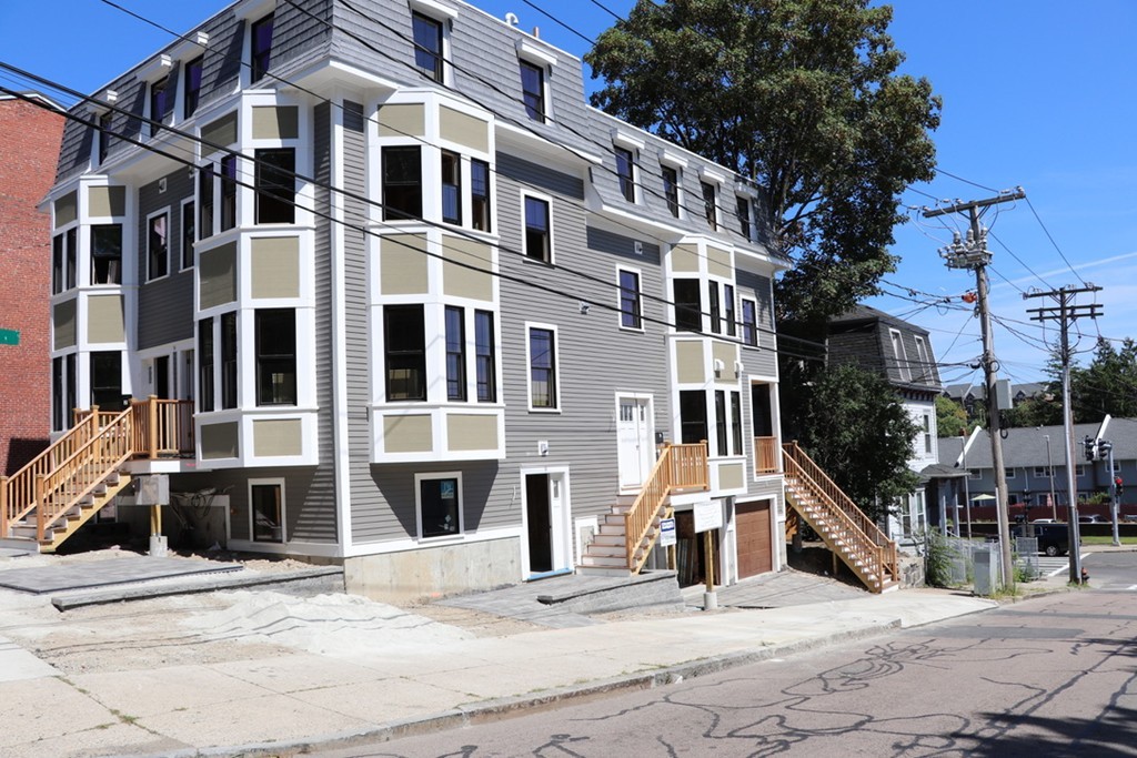 a view of a building with a street
