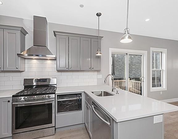 9 Cedar Street, Unit 1 Boston, MA 02119 - Photo 11 of 16 a kitchen with a stove and a sink