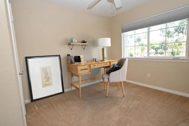 a view of a hallway with a white walls