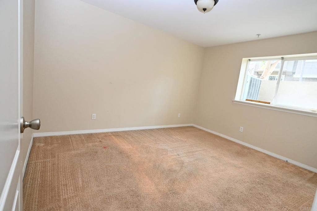 4035 Bluff View Way Carlsbad, CA 92008 - Photo 12 of 38 a view of an empty room with a window