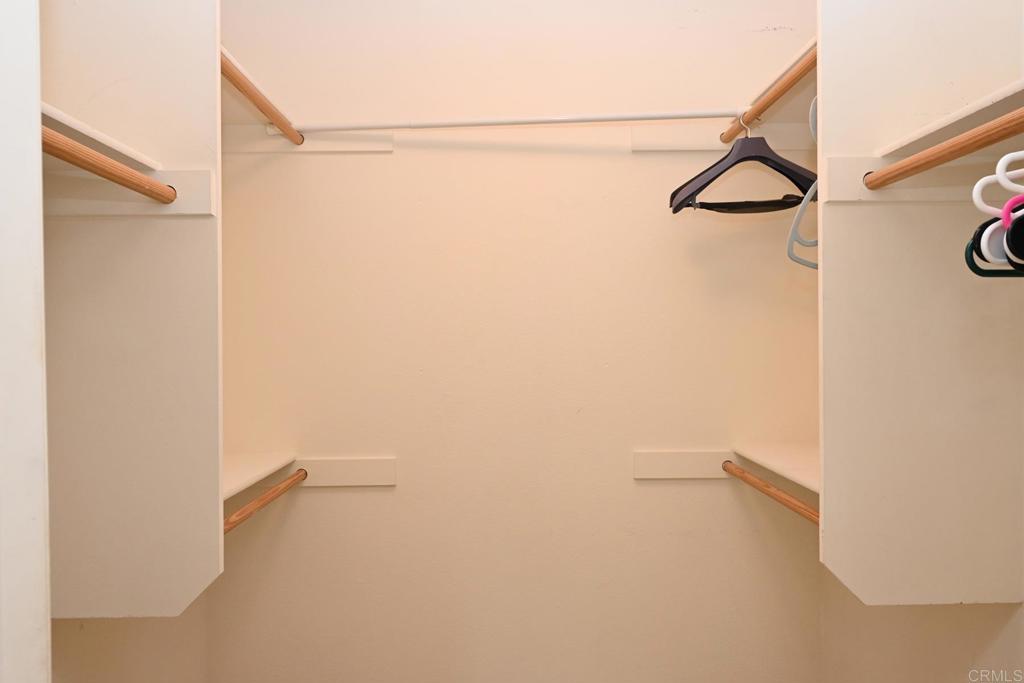 4035 Bluff View Way Carlsbad, CA 92008 - Photo 20 of 38 a view of a room with racks on the wall