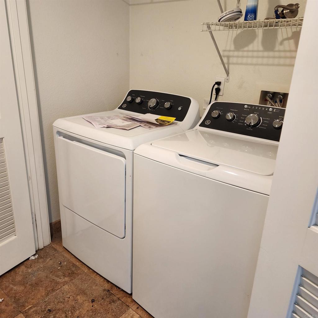4035 Bluff View Way Carlsbad, CA 92008 - Photo 26 of 38 a utility room with dryer and washer