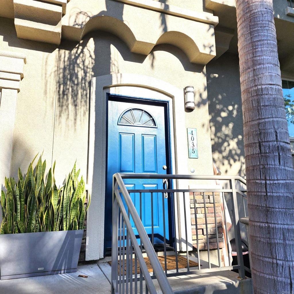 4035 Bluff View Way Carlsbad, CA 92008 - Photo 32 of 38 a view of staircase with a potted plant