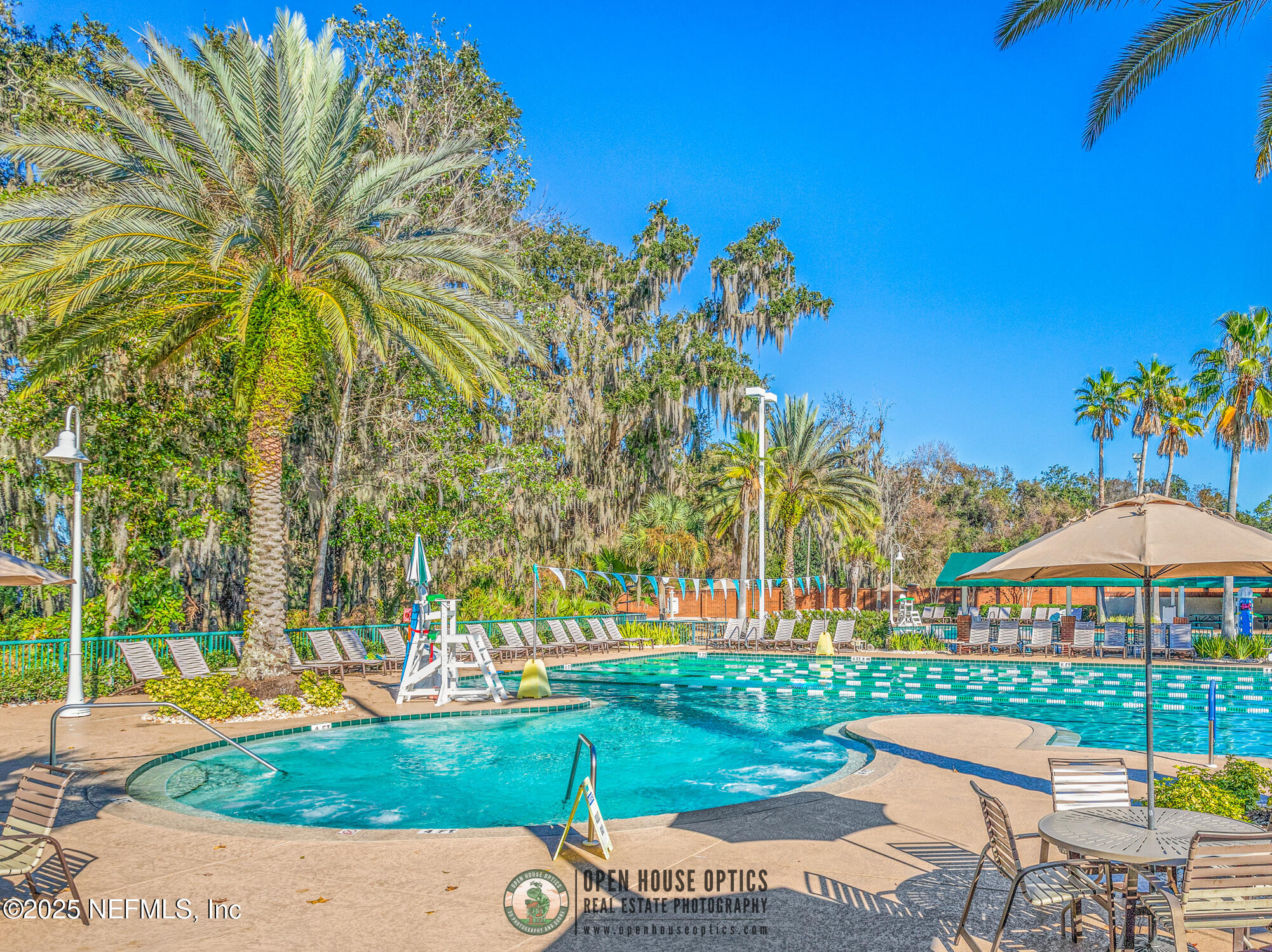 2676 Country Side Drive Fleming Island, FL 32003 - Photo 116 of 125 a view of a swimming pool with a patio