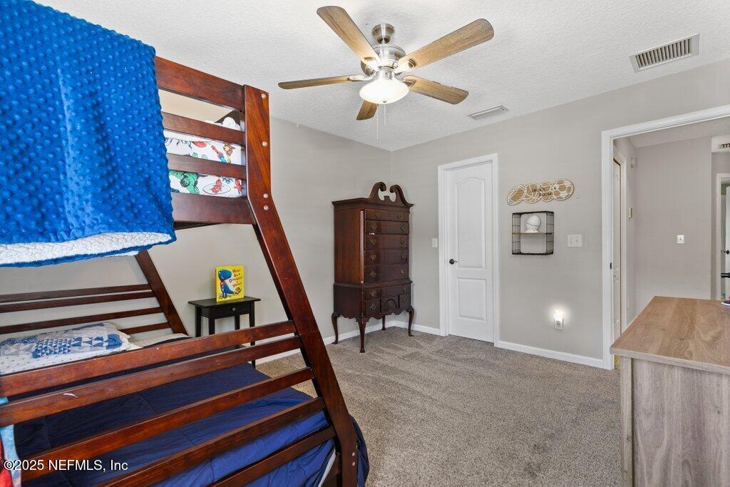 2676 Country Side Drive Fleming Island, FL 32003 - Photo 52 of 125 a view of an entryway with a workspace