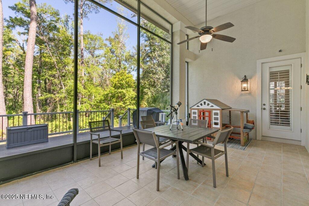 2676 Country Side Drive Fleming Island, FL 32003 - Photo 57 of 125 a view of a dining room with furniture window and outside view