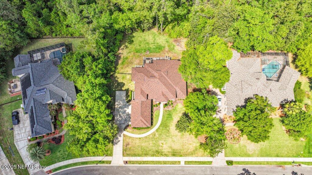 2676 Country Side Drive Fleming Island, FL 32003 - Photo 66 of 125 an aerial view of a house with yard swimming pool and outdoor seating