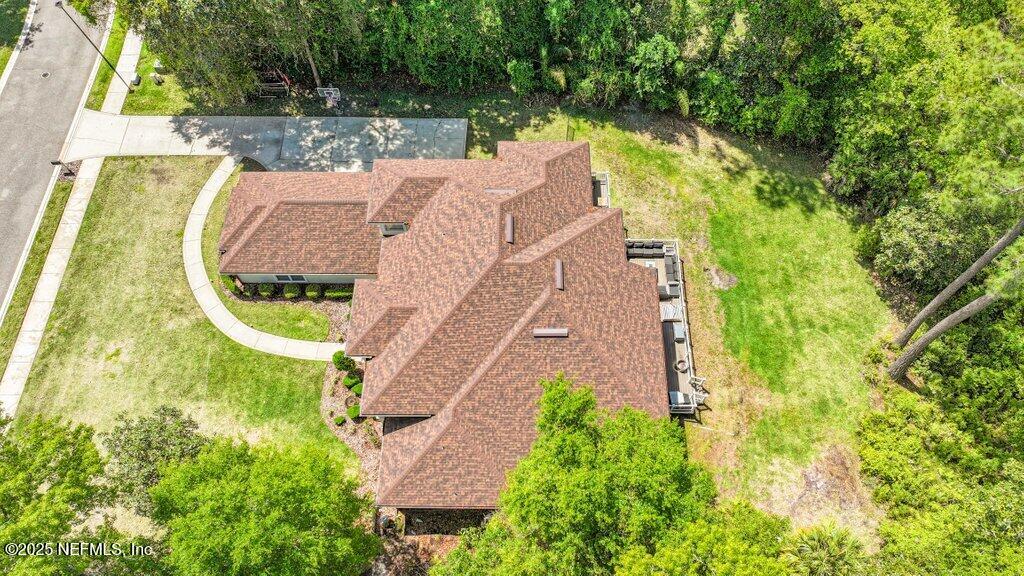 2676 Country Side Drive Fleming Island, FL 32003 - Photo 71 of 125 an aerial view of a house with outdoor space pool seating area and yard