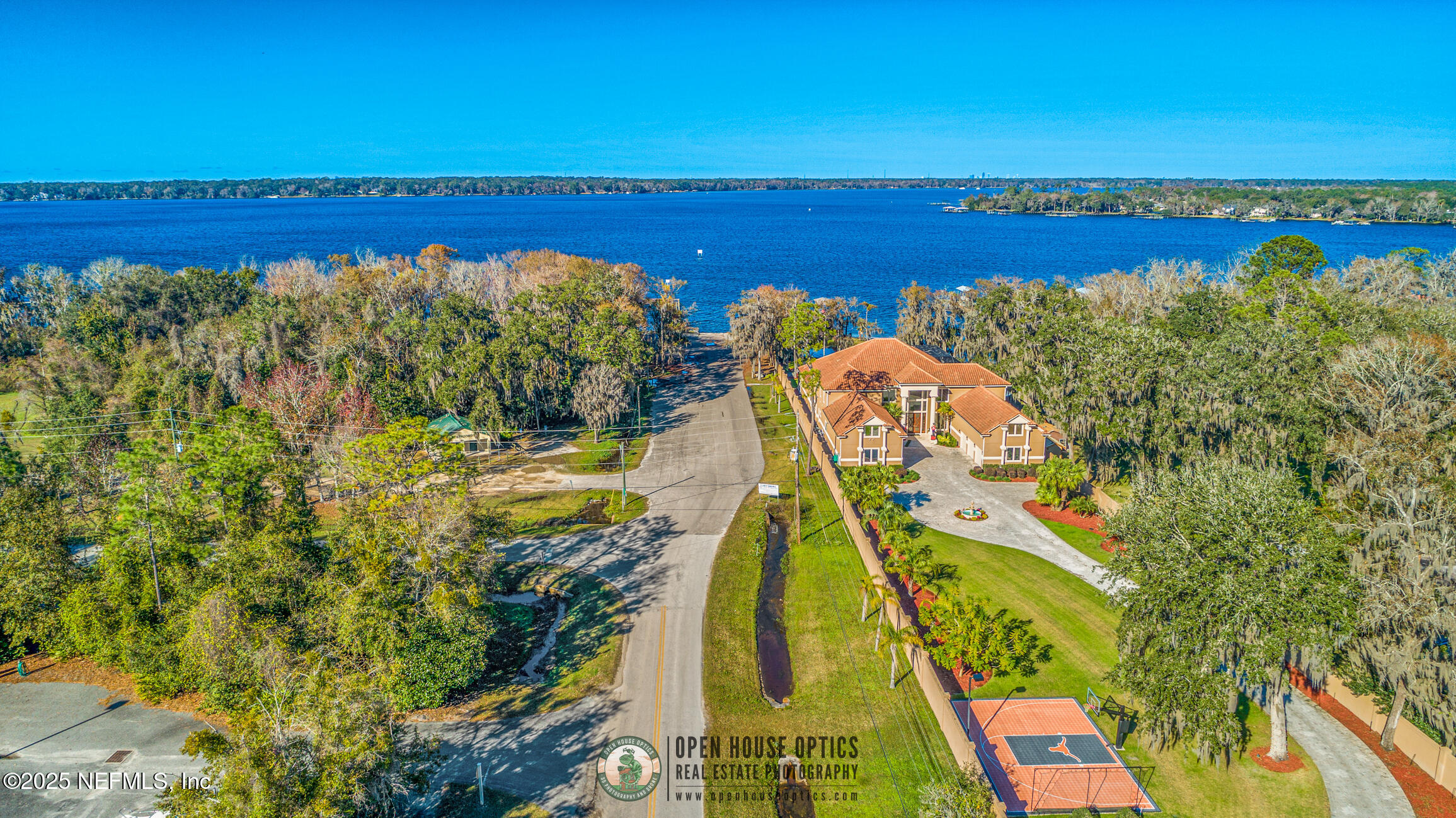 2676 Country Side Drive Fleming Island, FL 32003 - Photo 97 of 125 a view of a lake with a city