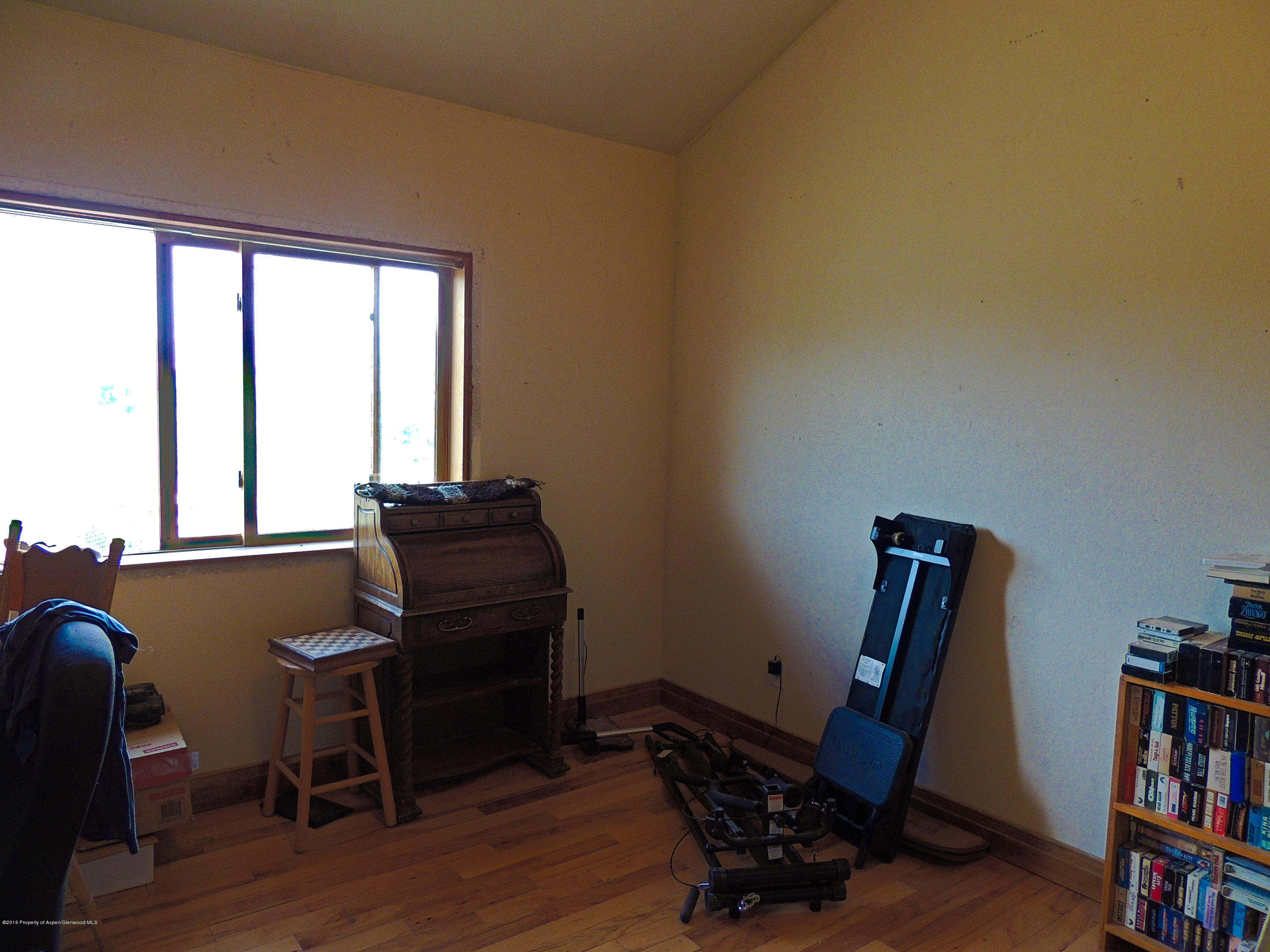 277 Miller Lane Rifle, CO 81650 - Photo 18 of 22 a view of a workspace with furniture and a window