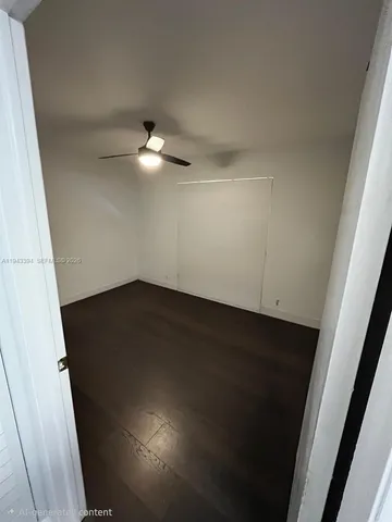 a bathroom with a toilet sink and shower