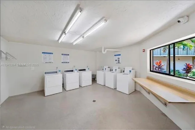 a view of an swimming pool with a yard and plants