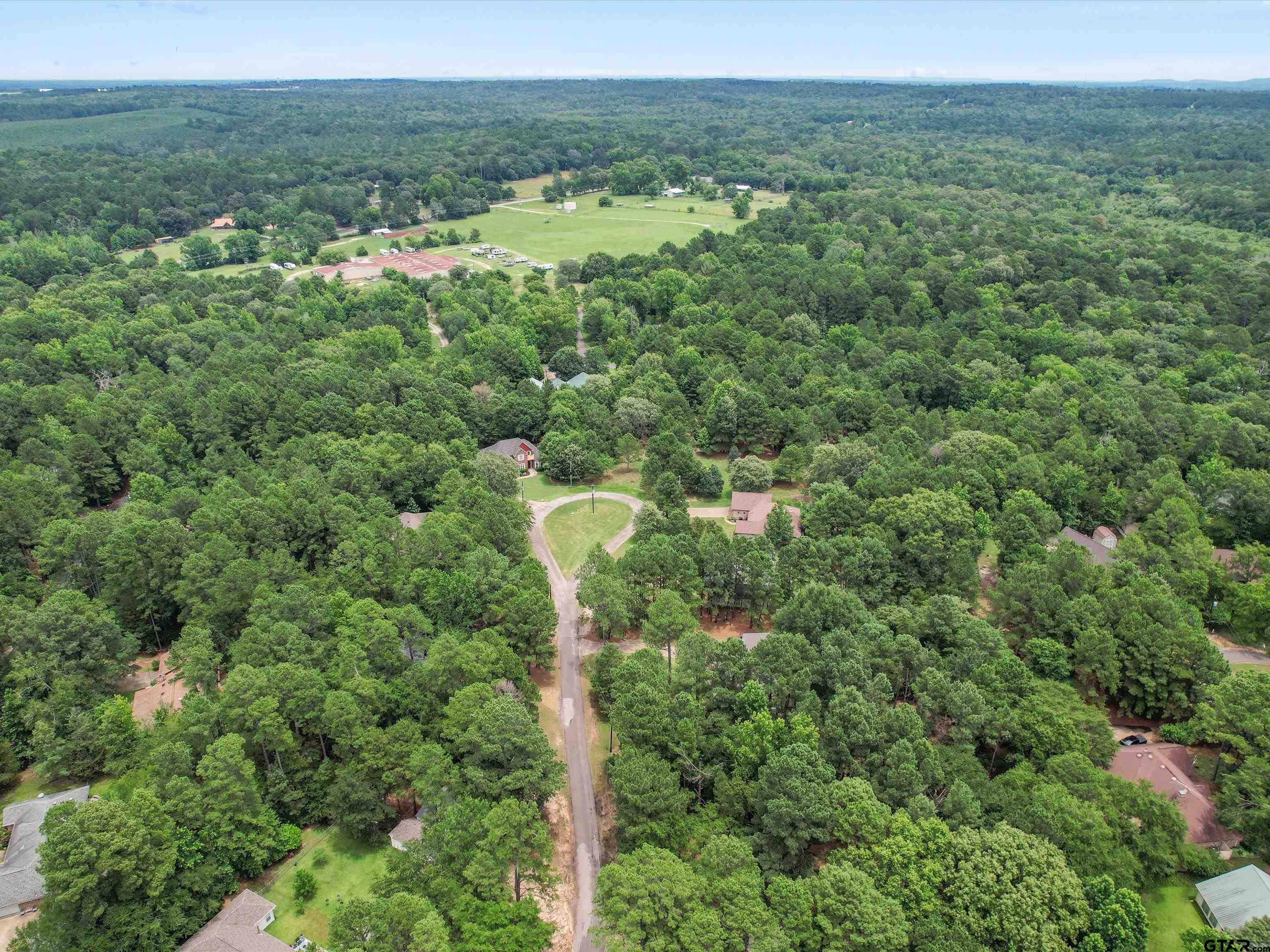 204 Pack Saddle Holly Lake Ranch, TX 75765 - Photo 11 of 11 a view of a city with lush green forest