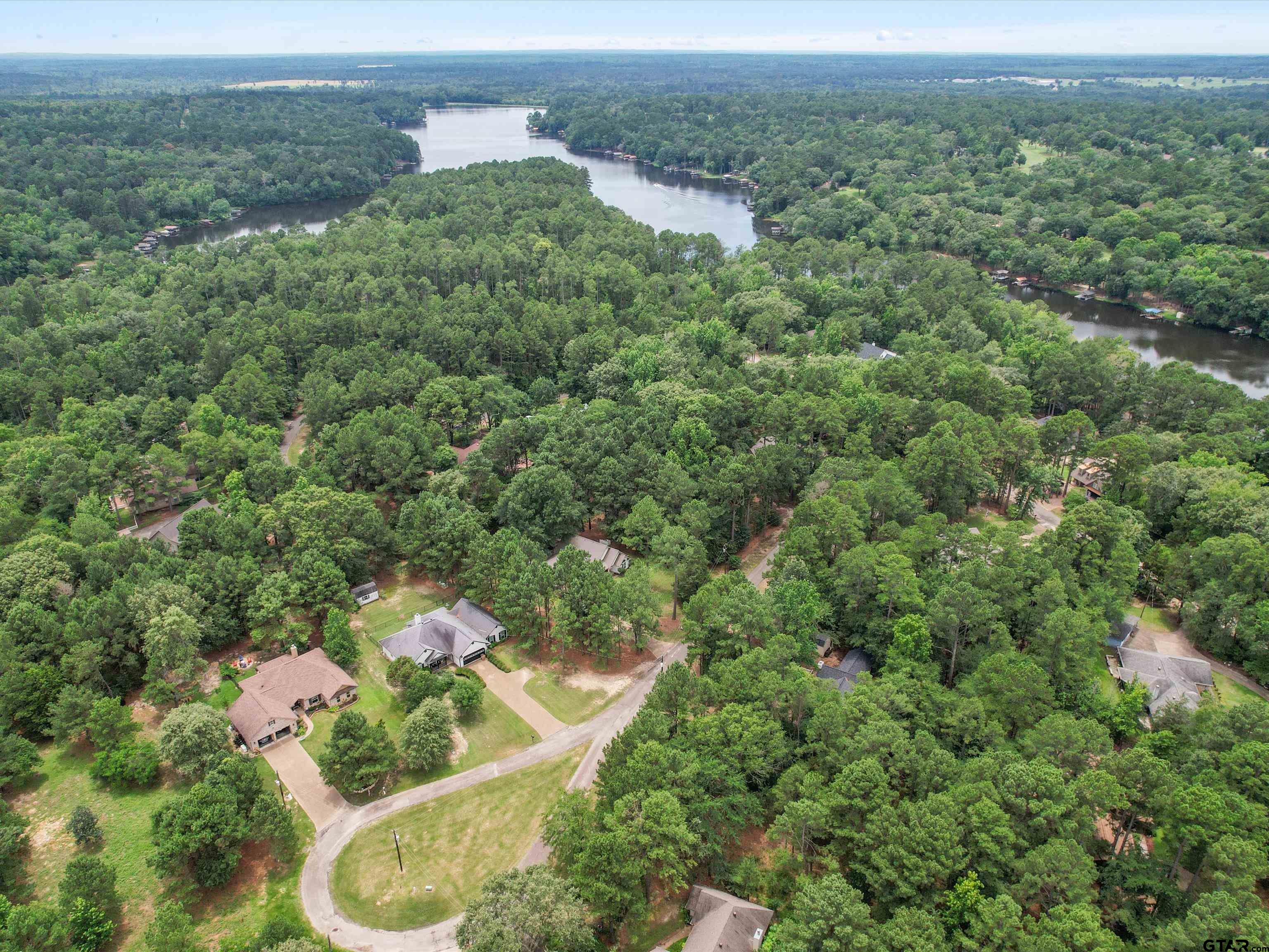 204 Pack Saddle Holly Lake Ranch, TX 75765 - Photo 7 of 11 an aerial view of a house with a yard