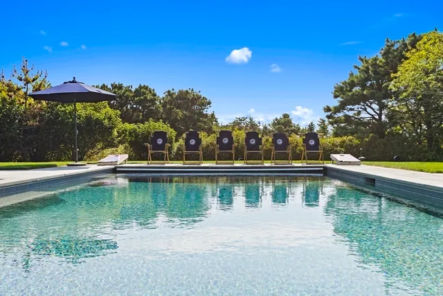 a view of a lake with a house
