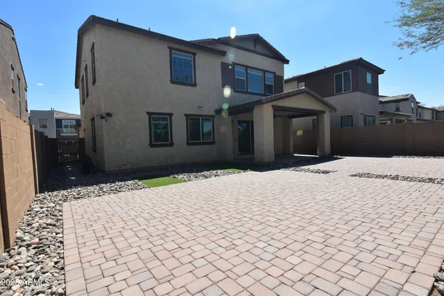 a view of storage and utility room with two washing machine