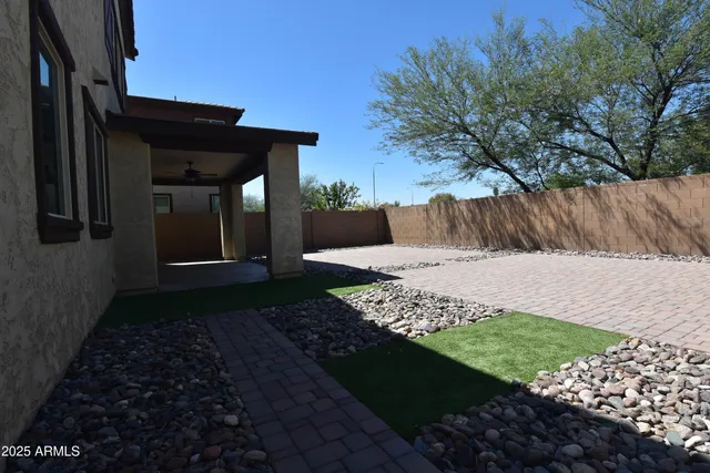 a view of kitchen and refrigerator
