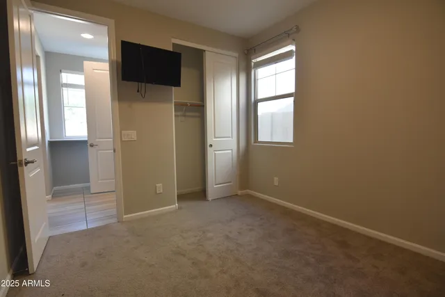 a bathroom with a toilet and a sink