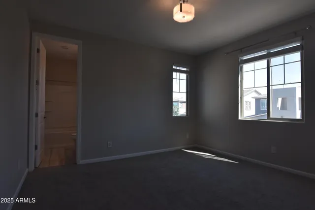 a bathroom with a double vanity sink and mirror