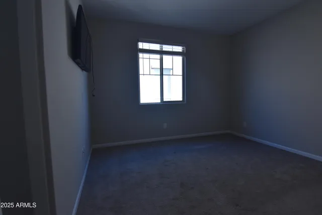 a bathroom with a sink double vanity and a mirror