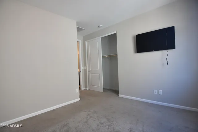 a bathroom with a toilet and a sink