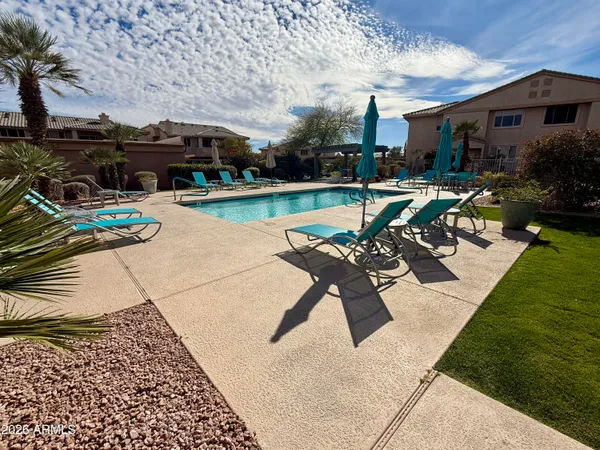 a lobby with furniture and wooden floor