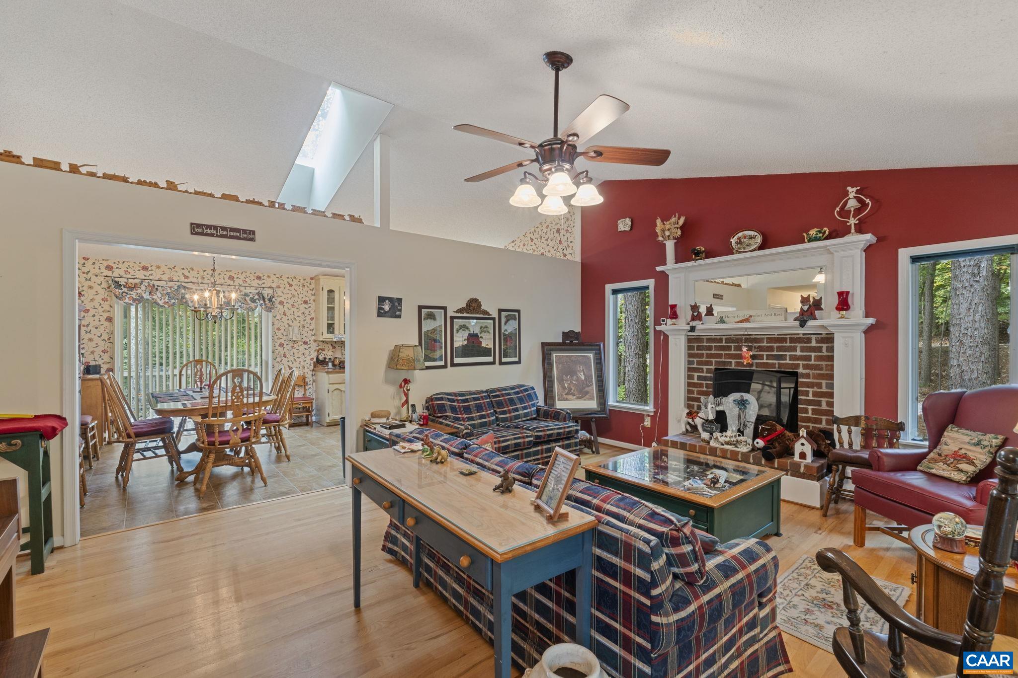 11 Bellavista Road Palmyra, VA 22963 - Photo 8 of 39 a living room with lots of furniture and a chandelier