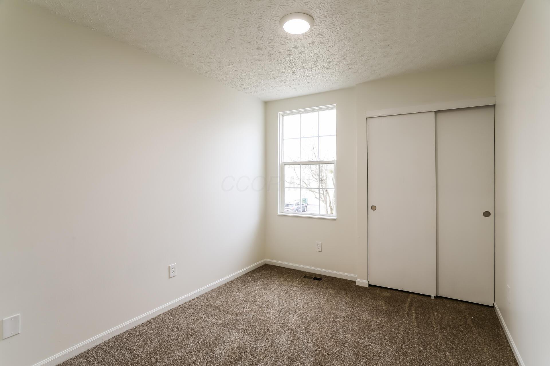 2177 Margo Road Columbus, OH 43229 - Photo 13 of 15 12-photo-Bedroom-3b530f1d-f58c-4ef2-a30b