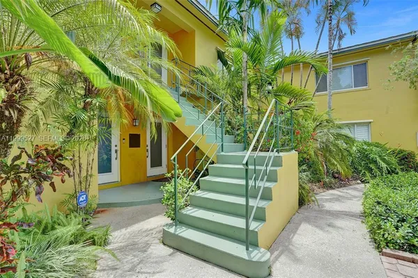 a view of stairs and garden