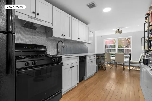 a view of a bench in a backyard