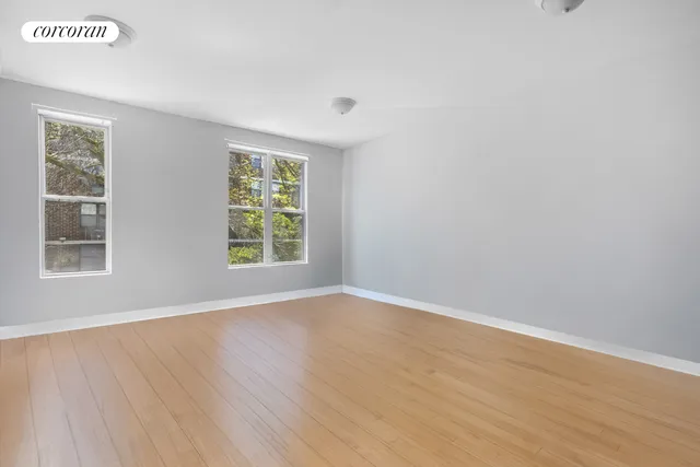 a room with a bed and a chair