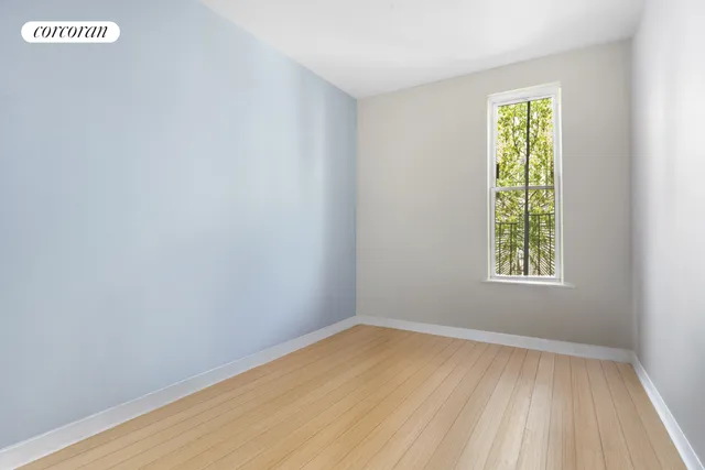a kitchen with a refrigerator and a stove