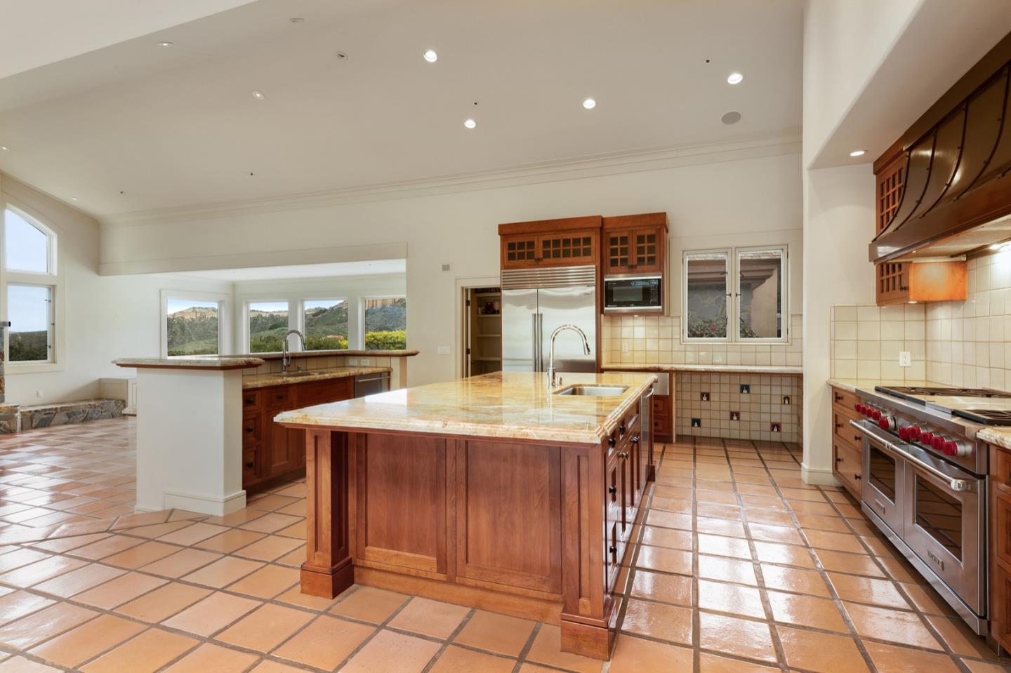14550 Castlerock Road Salinas, CA 93908 - Photo 22 of 100 a kitchen with stainless steel appliances granite countertop a stove a sink and a refrigerator
