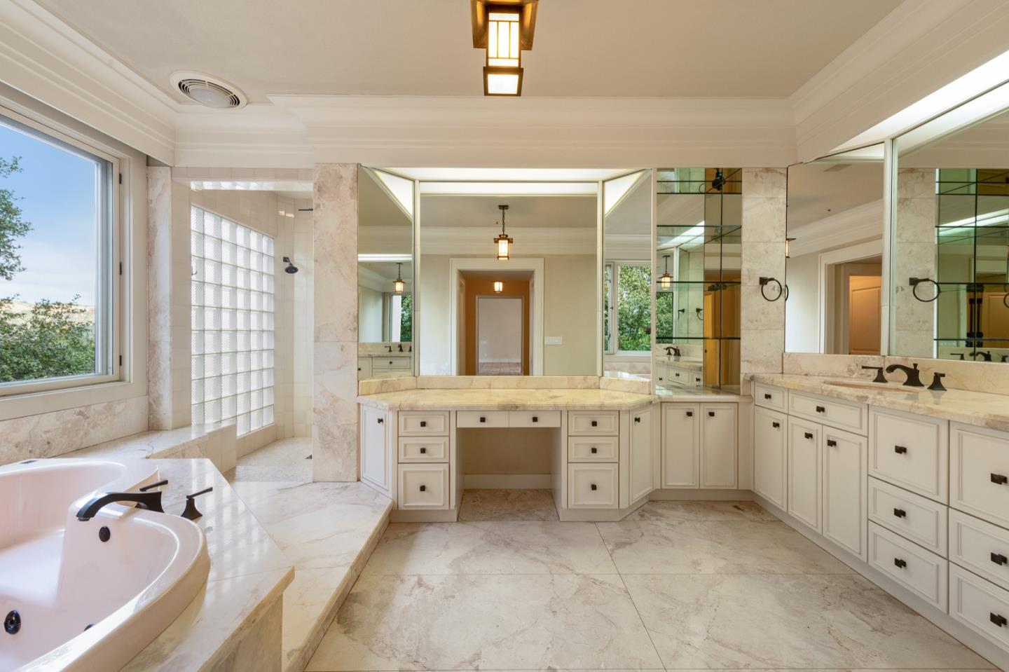 14550 Castlerock Road Salinas, CA 93908 - Photo 55 of 100 a spacious bathroom with a granite countertop tub double vanity and a large mirror