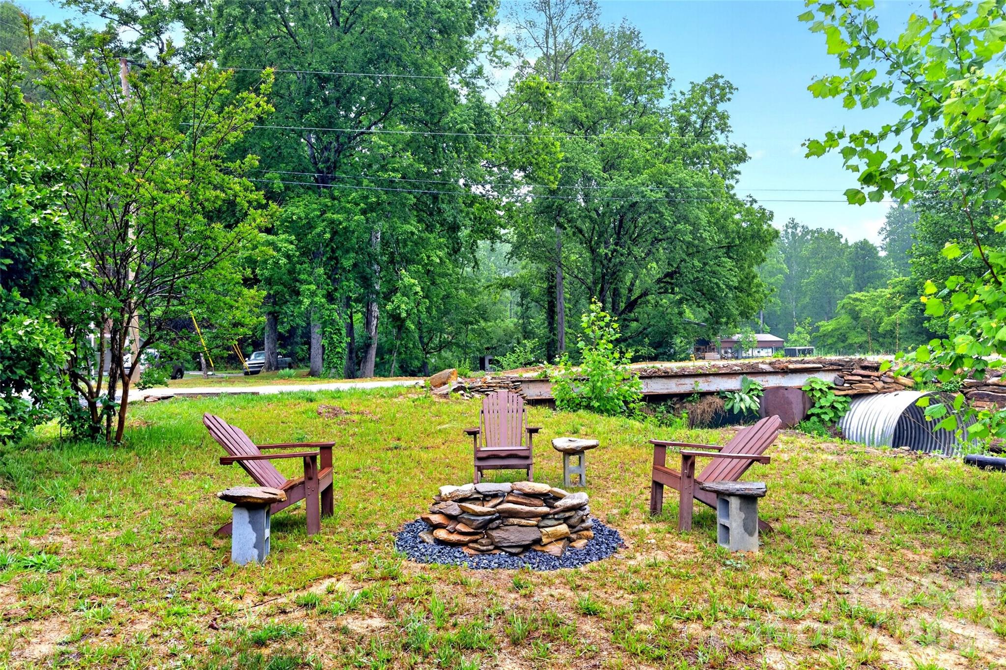 227 Locust Cove Road Marion, NC 28752 - Photo 20 of 34 a view of a swimming pool with a patio