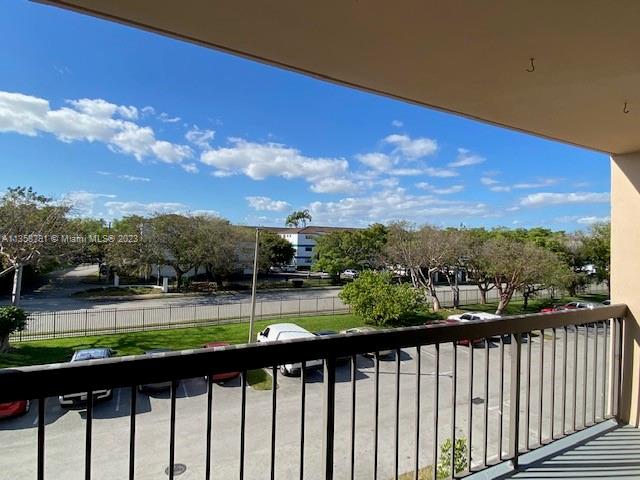 10985 Southwest 107th Street, Unit 305 Miami, FL 33176 - Photo 14 of 20 a view of a street from a balcony