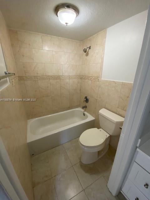 10985 Southwest 107th Street, Unit 305 Miami, FL 33176 - Photo 10 of 20 a bathroom with a toilet and a bathtub