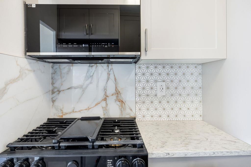6040 Boulevard East, Unit 22F West New York, NJ 07093 - Photo 13 of 44 a view of a utility room