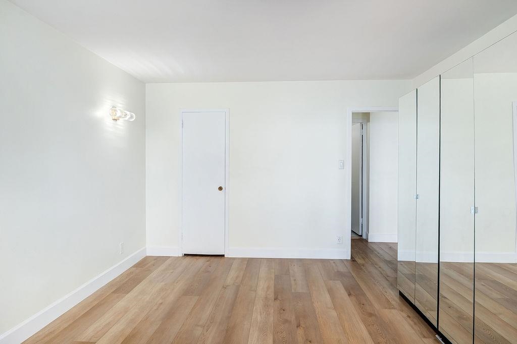 6040 Boulevard East, Unit 22F West New York, NJ 07093 - Photo 19 of 44 a view of an empty room