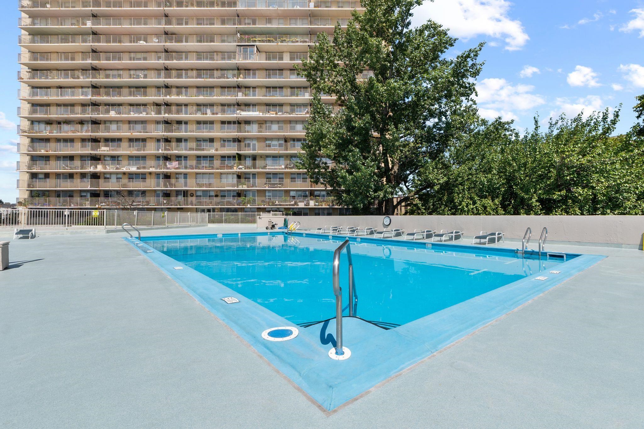 6040 Boulevard East, Unit 22F West New York, NJ 07093 - Photo 32 of 44 a view of a swimming pool and an outdoor space