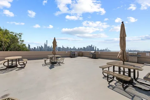 a view of a terrace with sitting area
