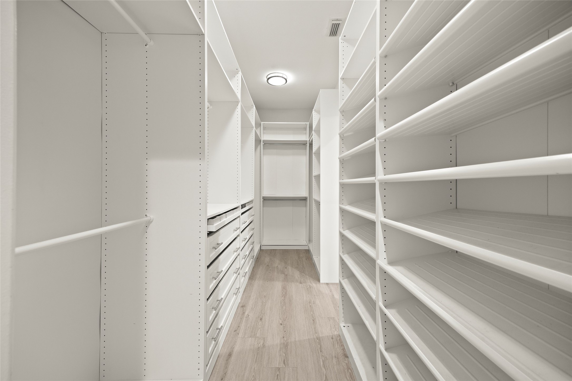 6239 Agassi Ace Court Spring, TX 77379 - Photo 14 of 19 Amazing primary walk in closet with an abundance of shelving