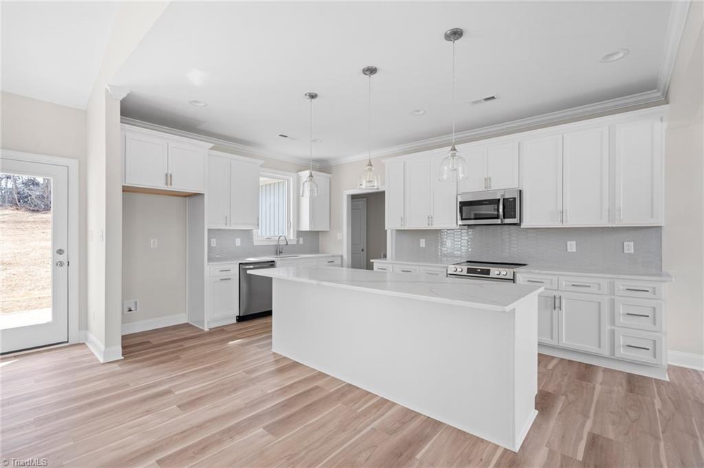 6439 Post Road Thomasville, NC 27360 - Photo 12 of 33 Large kitchen and island