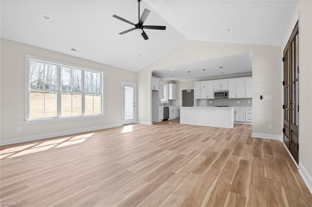 6439 Post Road Thomasville, NC 27360 - Photo 7 of 33 Vaulted LR ceilings and open to the kitchen