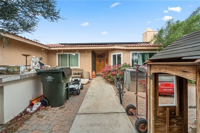 a view of a house with sitting area