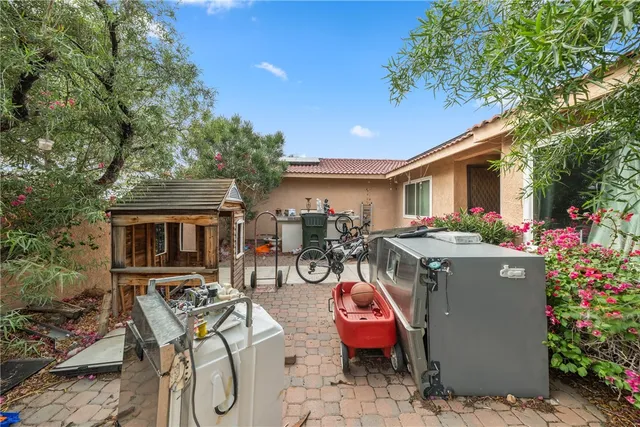 a view of outdoor dining space and patio