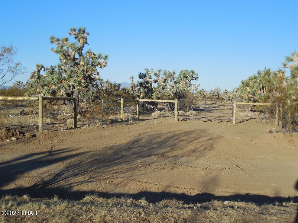271 South Six Shooter Road Yucca, AZ 86438 - Photo 3 of 54 Gated entrance
