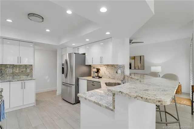 $675,000 | 303 Sea Oats Drive, Unit A, Juno Beach, FL 33408