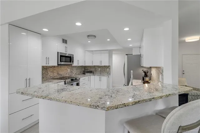 $675,000 | 303 Sea Oats Drive, Unit A, Juno Beach, FL 33408